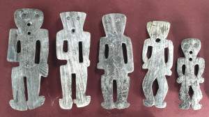An Ancient Family? Photograph by Arthur W. Vokes of Hohokam figurines carved from seashell.